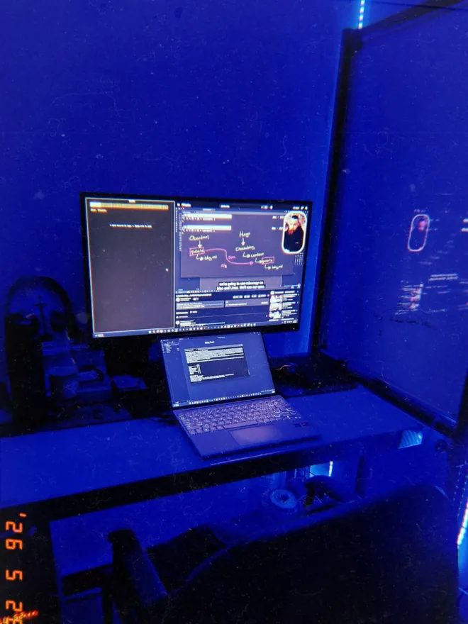 Late-night coding setup with blue ambient light